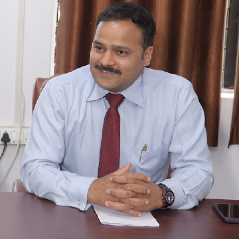 Dr. Praveen Tripathi